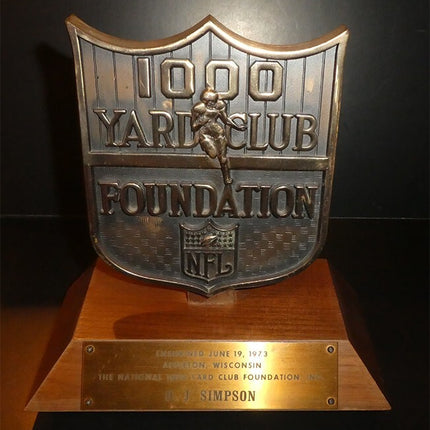 1973 NFL O.J. Simpson Trophy awarded for 1000 Yard Rushing Season (2000 Yards)