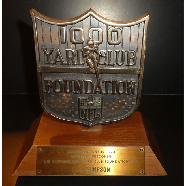 1973 NFL O.J. Simpson Trophy awarded for 1000 Yard Rushing Season (2000 Yards)