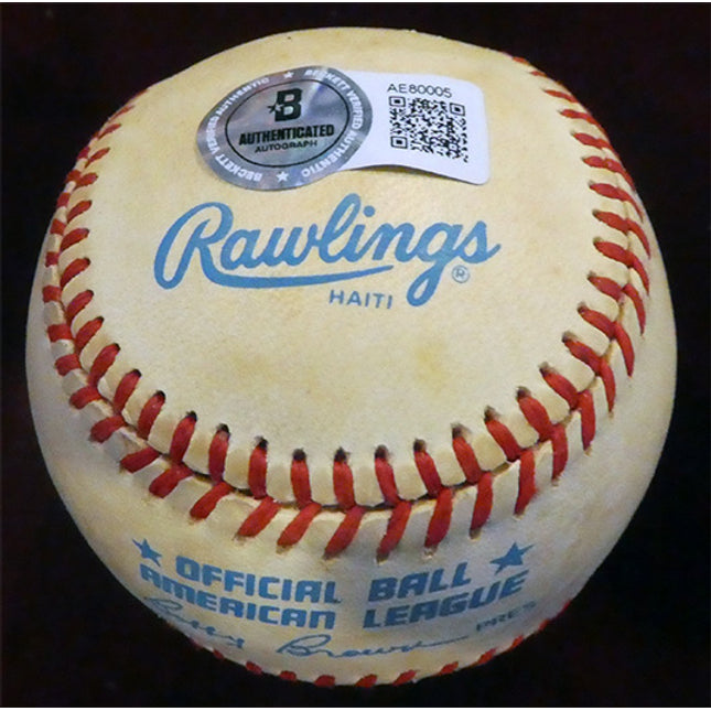 Baseball with Rawlings branding and an authentication label on a dark background