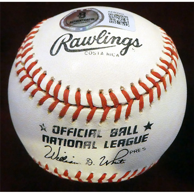 Rawlings baseball with red and white stitching on a dark background