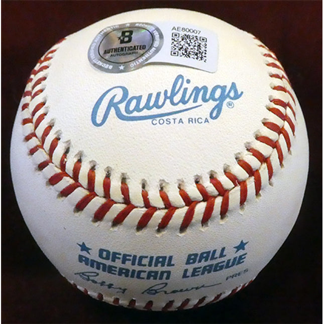 Rawlings baseball with authentication label on a dark background