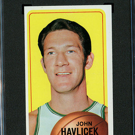 Vintage basketball trading card of John Havlicek with a yellow border and black text.
