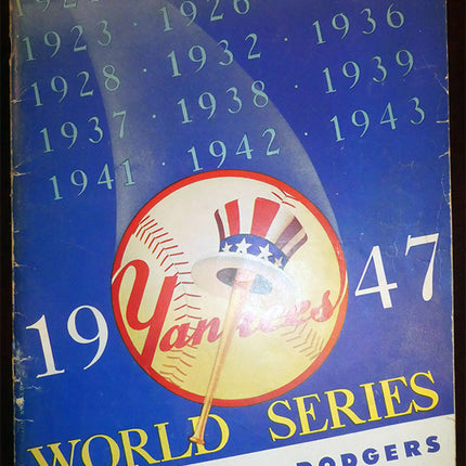 1947 World Series program cover featuring Yankees and Dodgers logos.