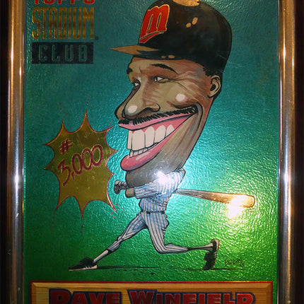 1994 Topps finest Dave Winfield Prototype. Depicts a caricature baseball card of Dave Winfield with a green background and gold accents.