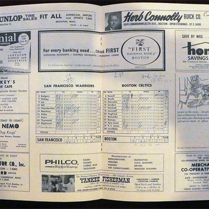 Program insert with scorecard and various advertisements.
