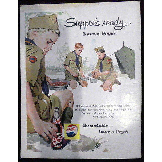 Back of magazine depicts a vintage Pepsi advertisement featuring Boy Scouts around a campfire with a bottle of Pepsi.